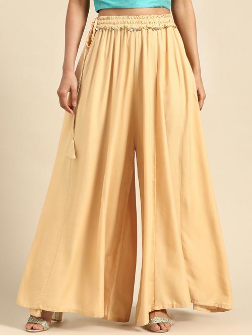 beige solid flared palazzo - 18383054 - Standard Image - 0
