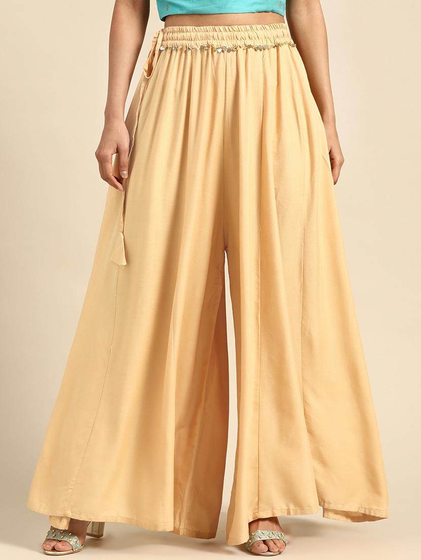 beige solid flared palazzo - 18383054 - Zoom Image - 0