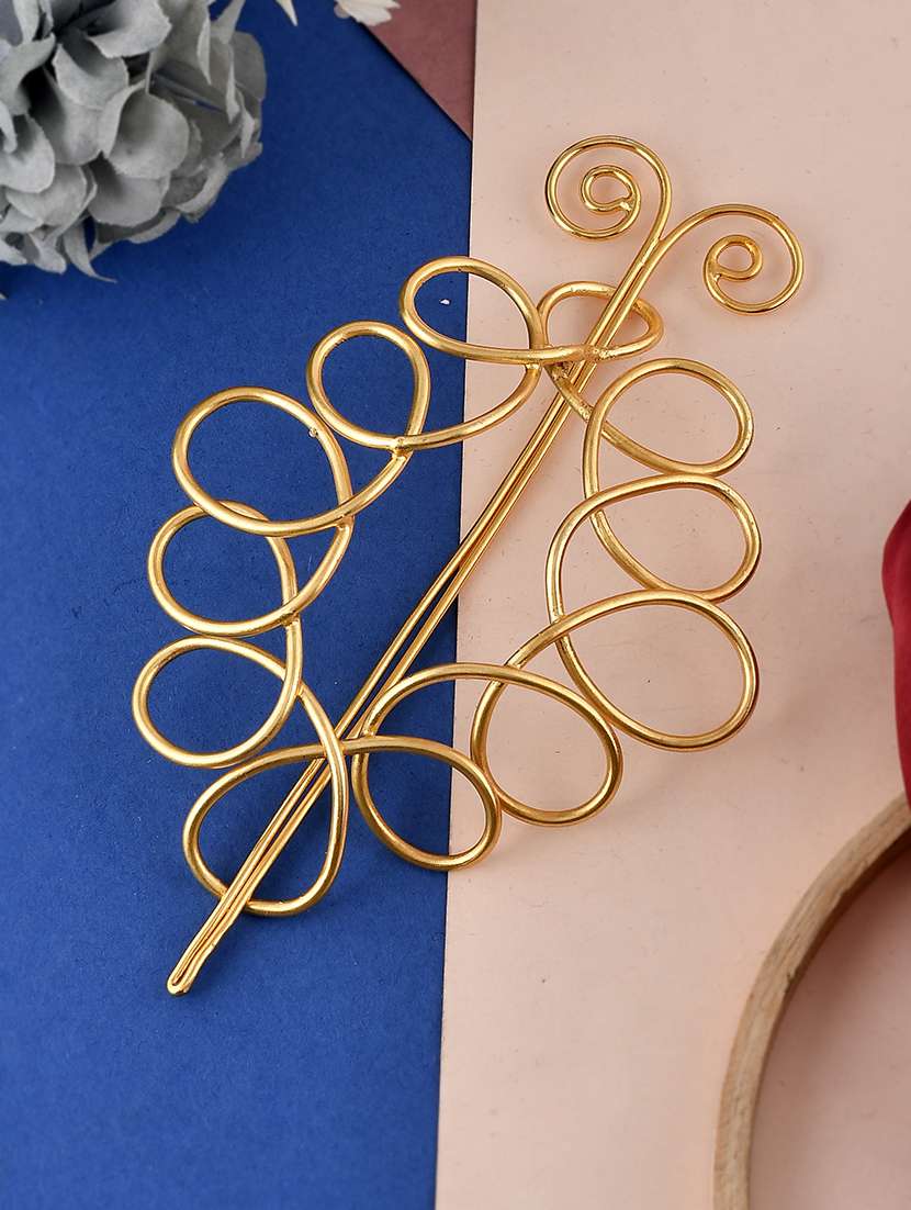 gold toned embellished hair accessory