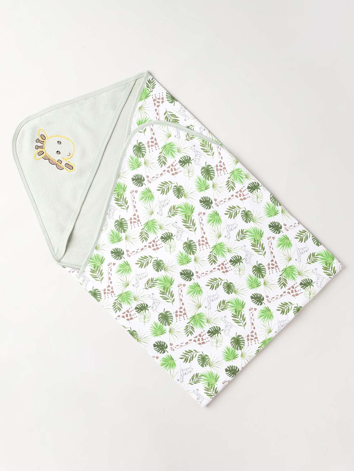green animal printed blanket 