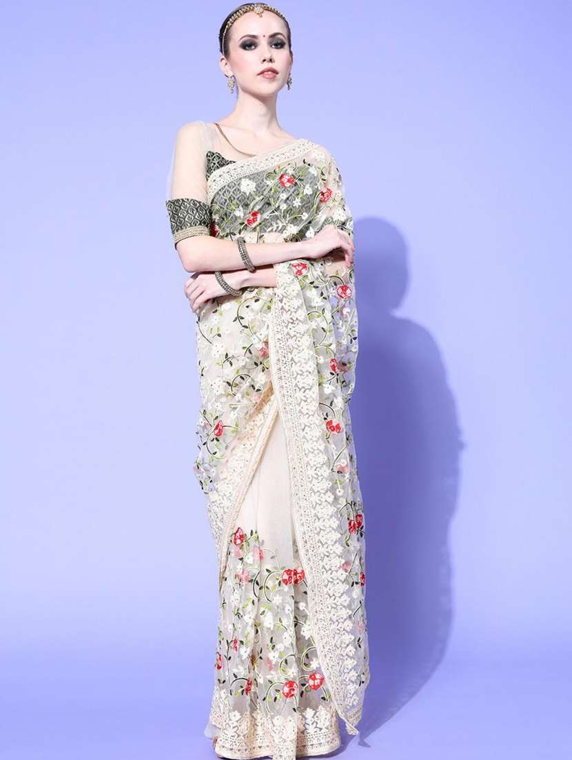 cream embroidered saree with blouse