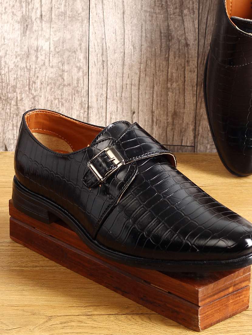 black textured slip on formal shoes