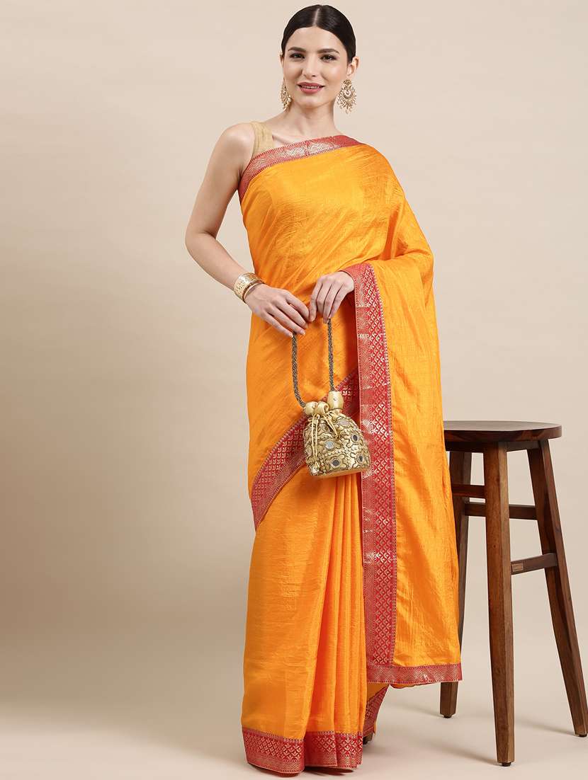 women's bordered orange colored saree with blouse