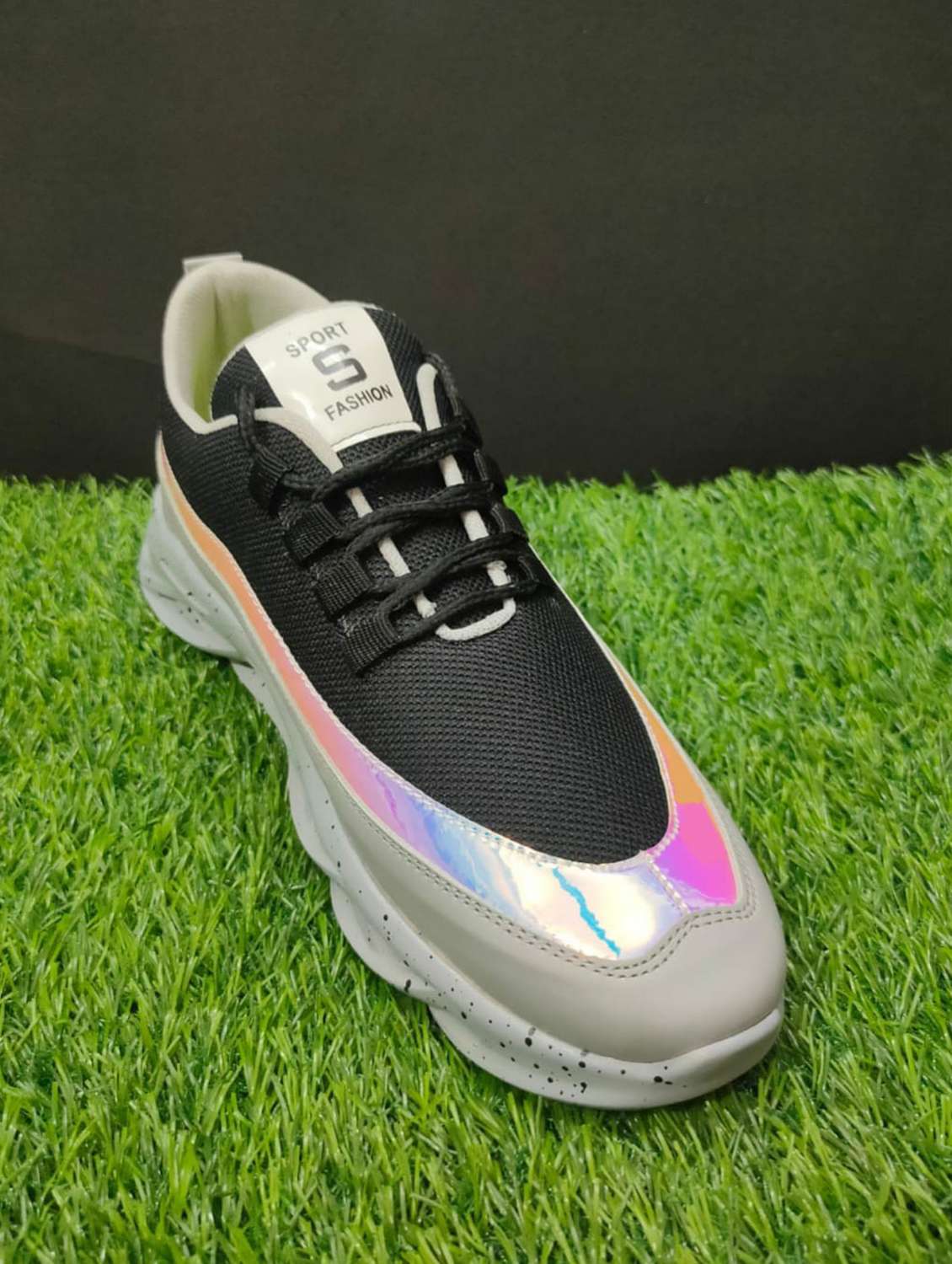 men lace up sports shoes