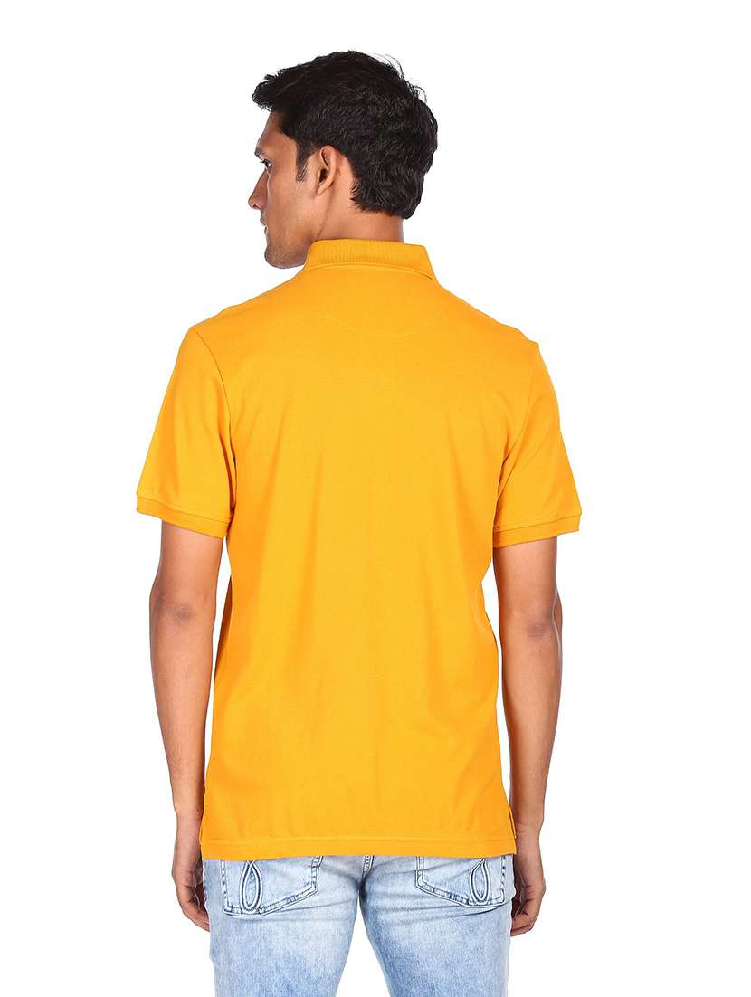 yellow solid polo t-shirt - 18429168 -  Standard Image - 2