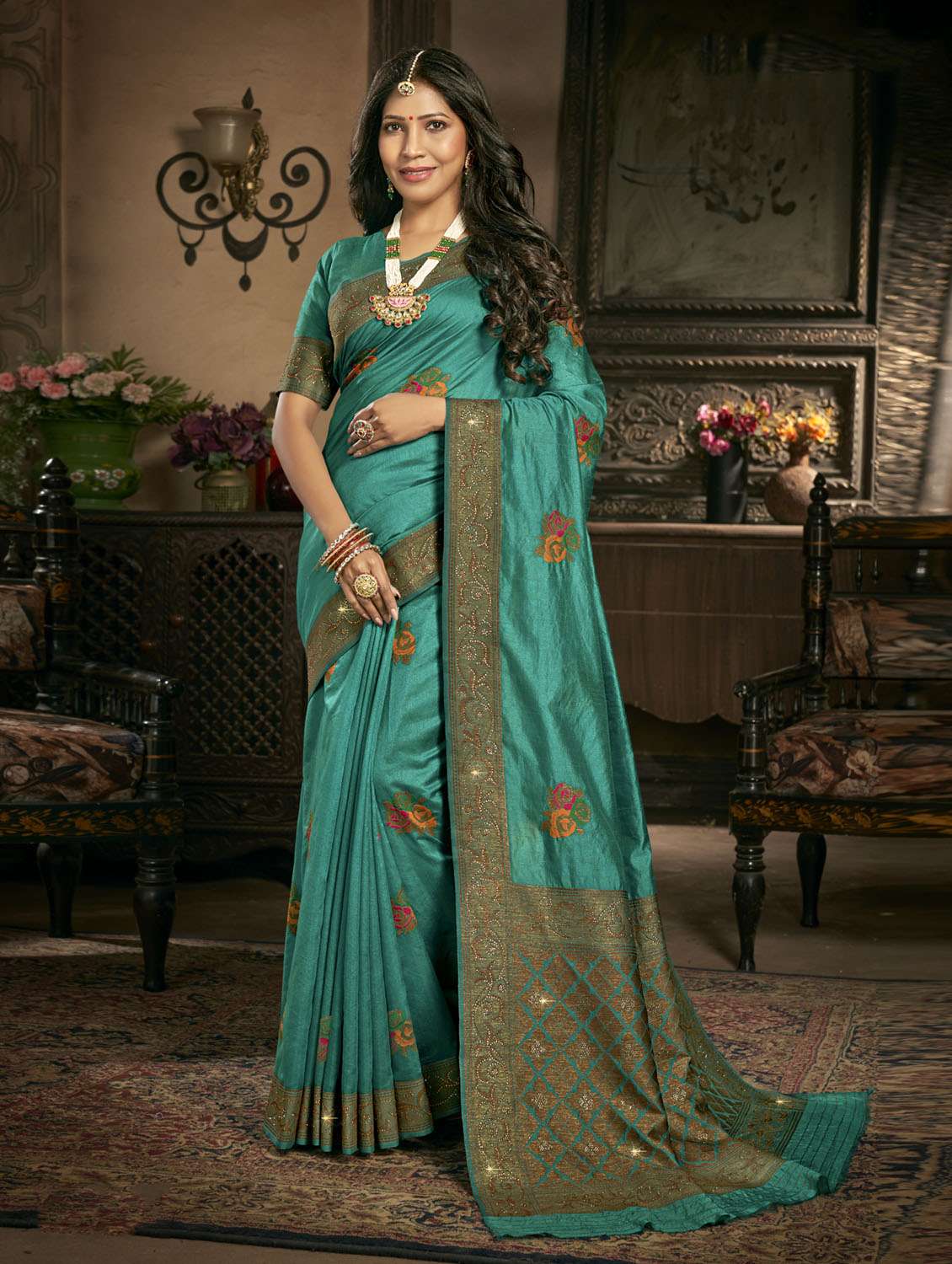 turquoise self design embroidered saree with blouse