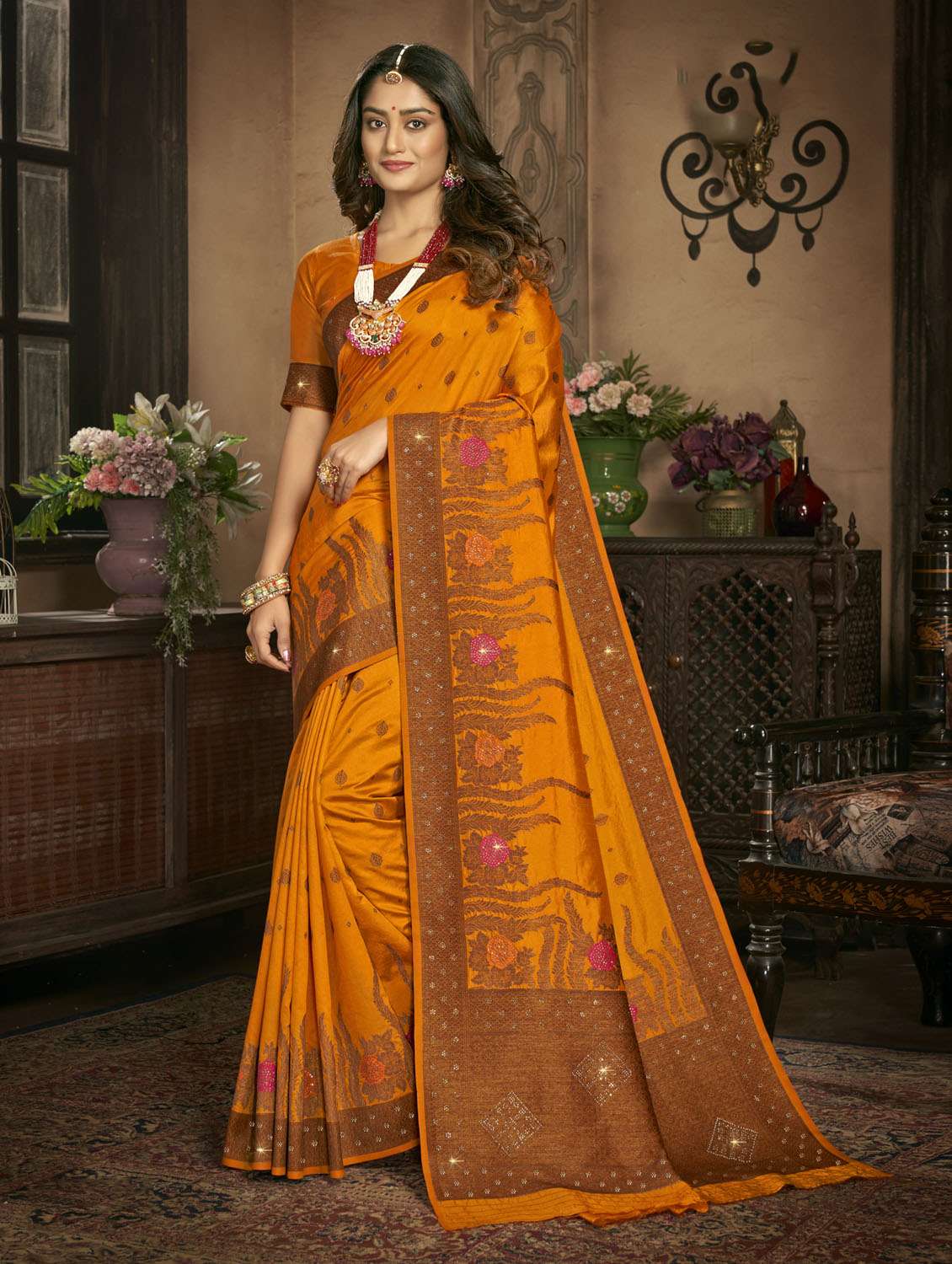 self design embroidered saree with blouse