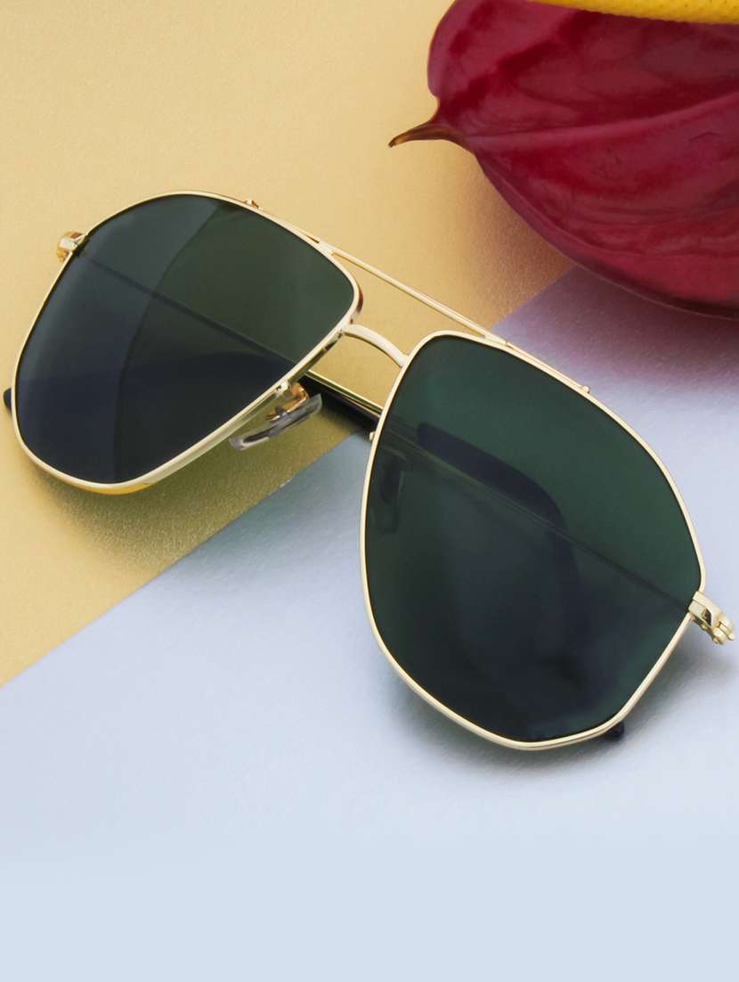 celeste aviator in green sunglasses 