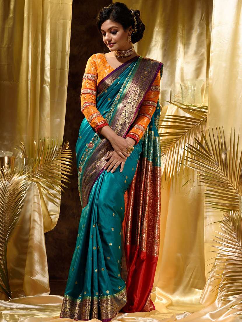 women's self design sea green colored saree with blouse