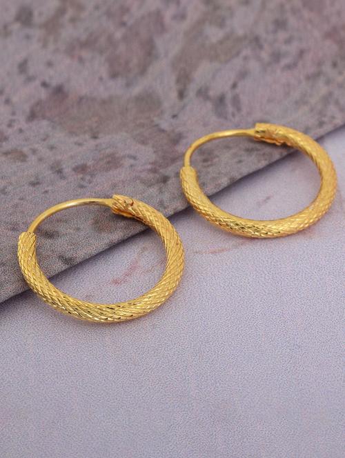 women golden hoop earring - 18534337 - Standard Image - 0