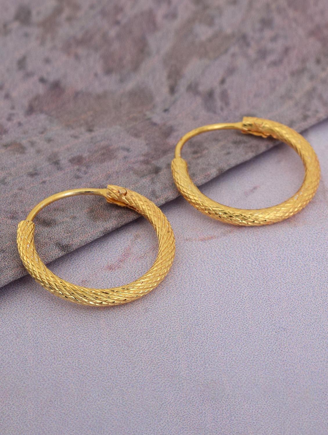 women golden hoop earring - 18534337 - Zoom Image - 0