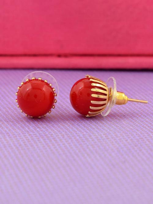 women red stud earring  - 18534355 -  Standard Image - 0