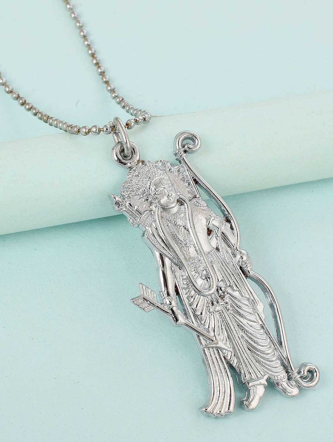 silver metal pendant
