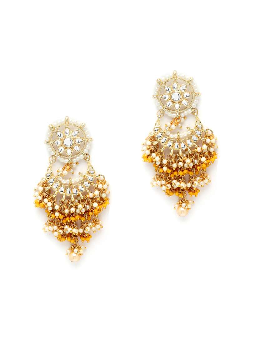 yellow metal earring