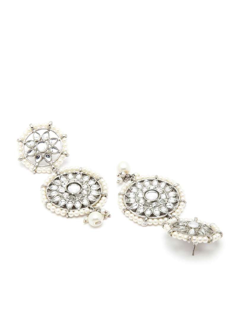 silver metal earring - 18633186 -  Standard Image - 2