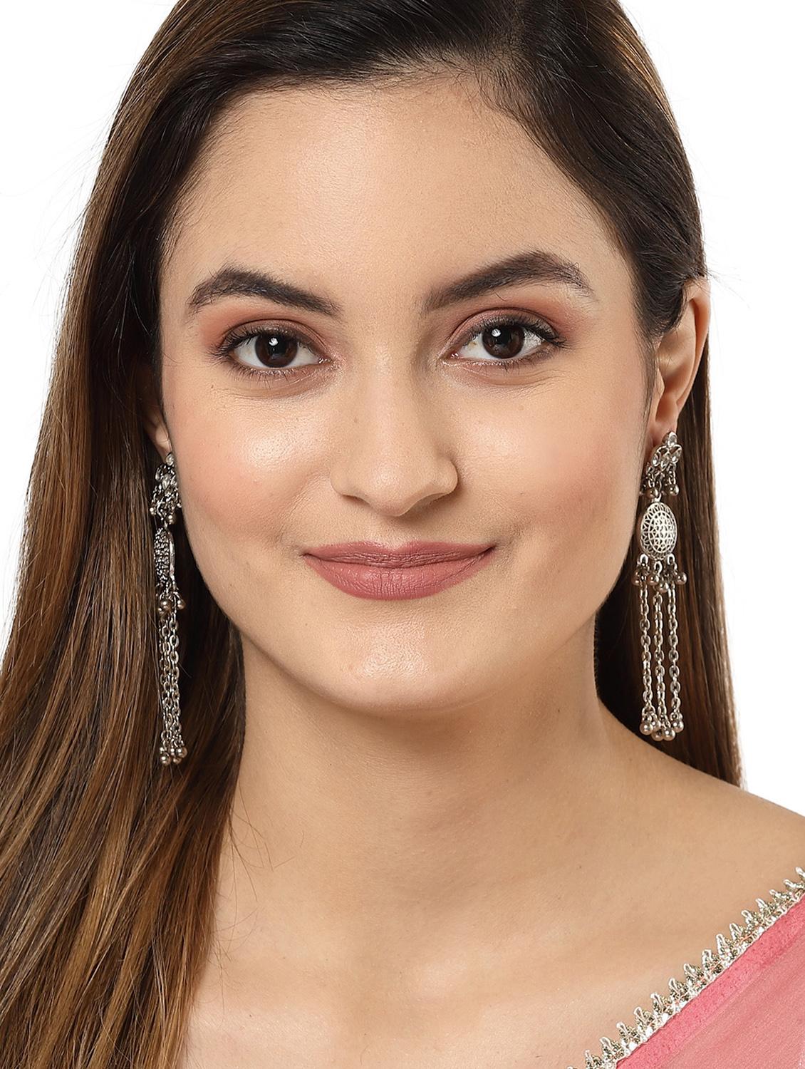 silver metal earring - 18633219 - Standard Image - 2