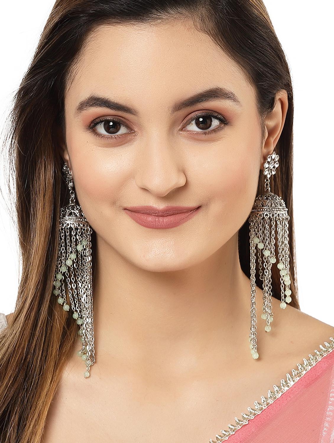 green metal earring - 18633220 - Standard Image - 2