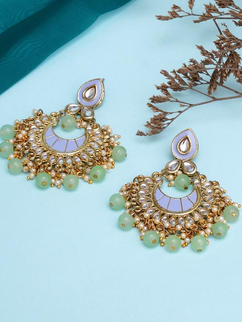 green metal earring - 18633248 -  Standard Image - 0