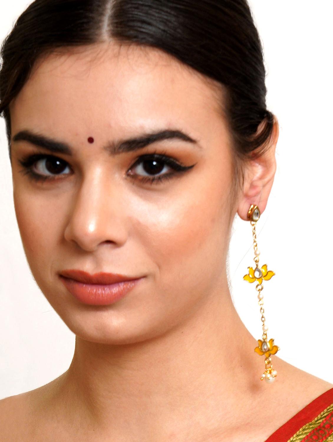 yellow metal earring - 18633258 - Standard Image - 2