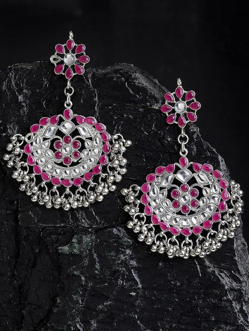 red metal earring - 18633273 -  Standard Image - 0