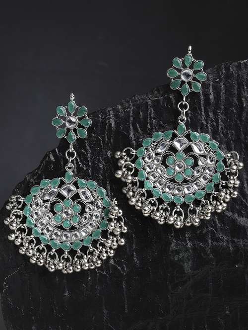 green metal earring - 18633275 -  Standard Image - 0
