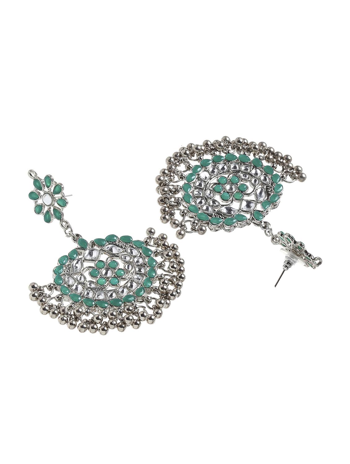 green metal earring - 18633275 - Standard Image - 2