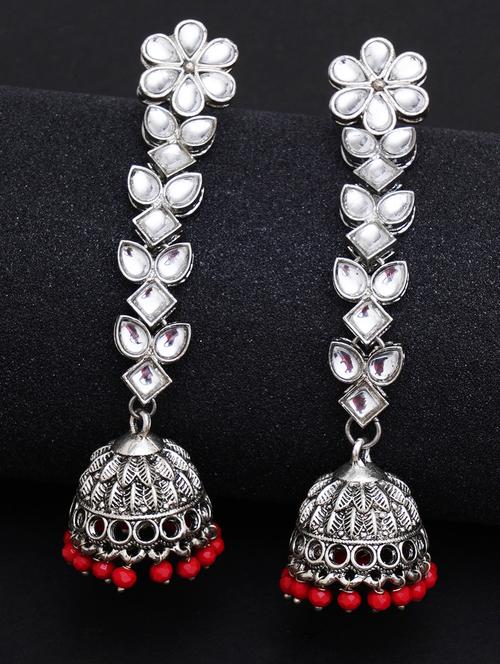 red metal earring - 18633429 -  Standard Image - 0