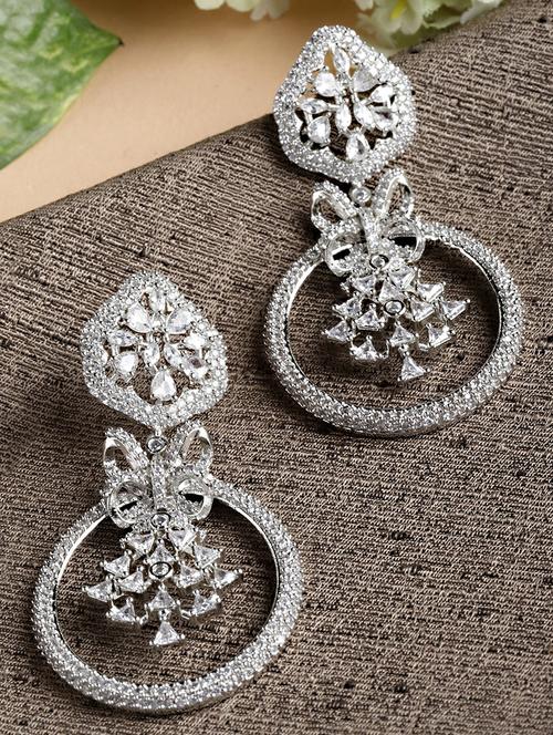 silver metal earring - 18633446 -  Standard Image - 0