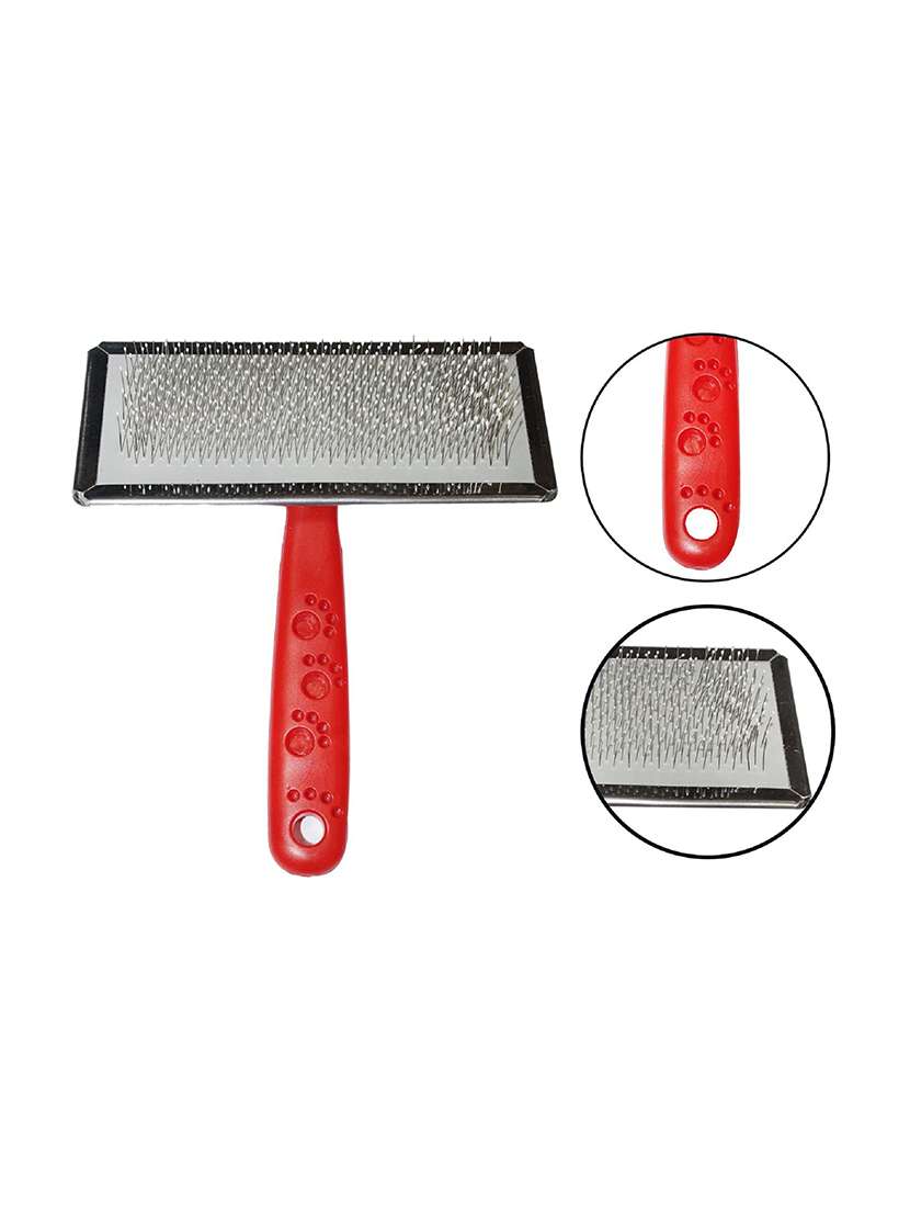red plastic pet comb brush - 18697138 -  Standard Image - 2