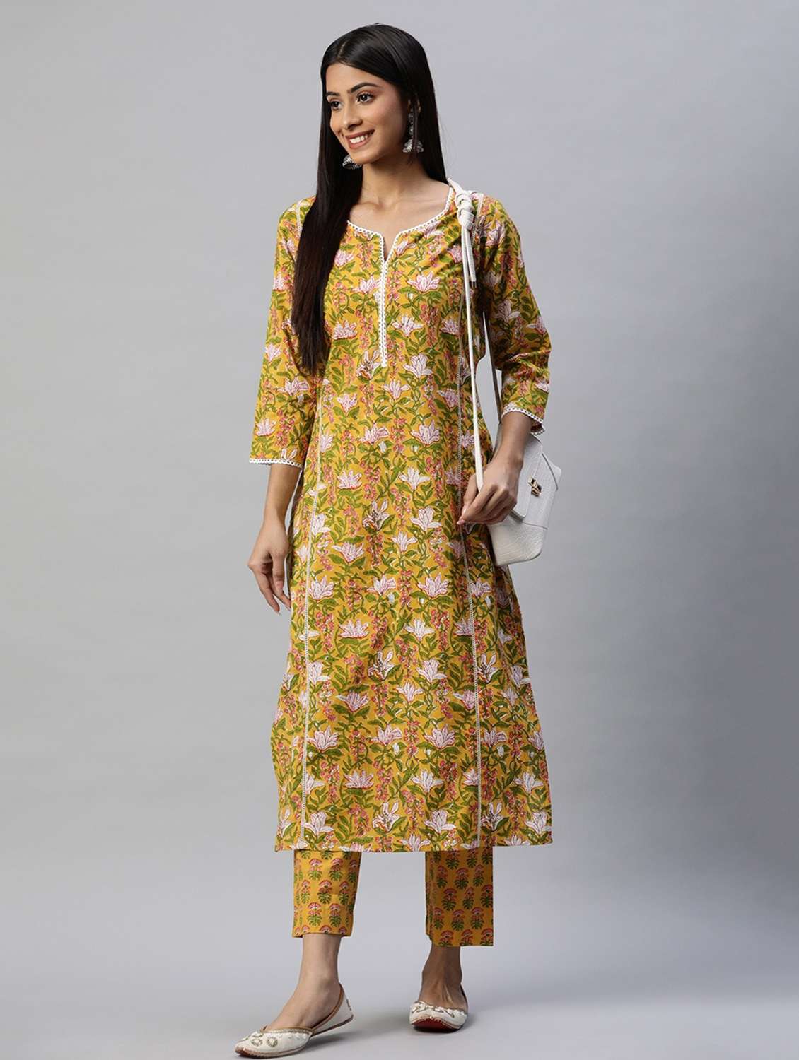 women yellow three quarter sleeve kurta pant set