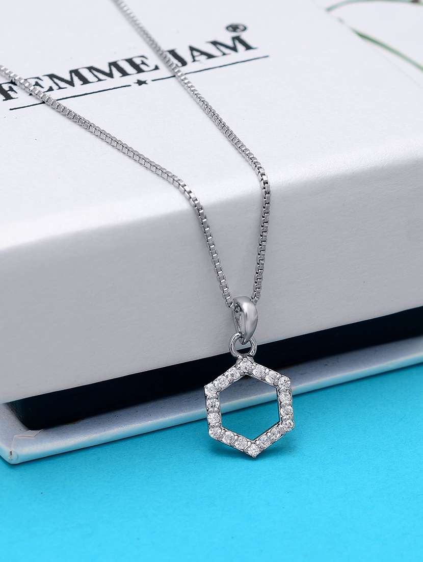 silver colored metal pendant