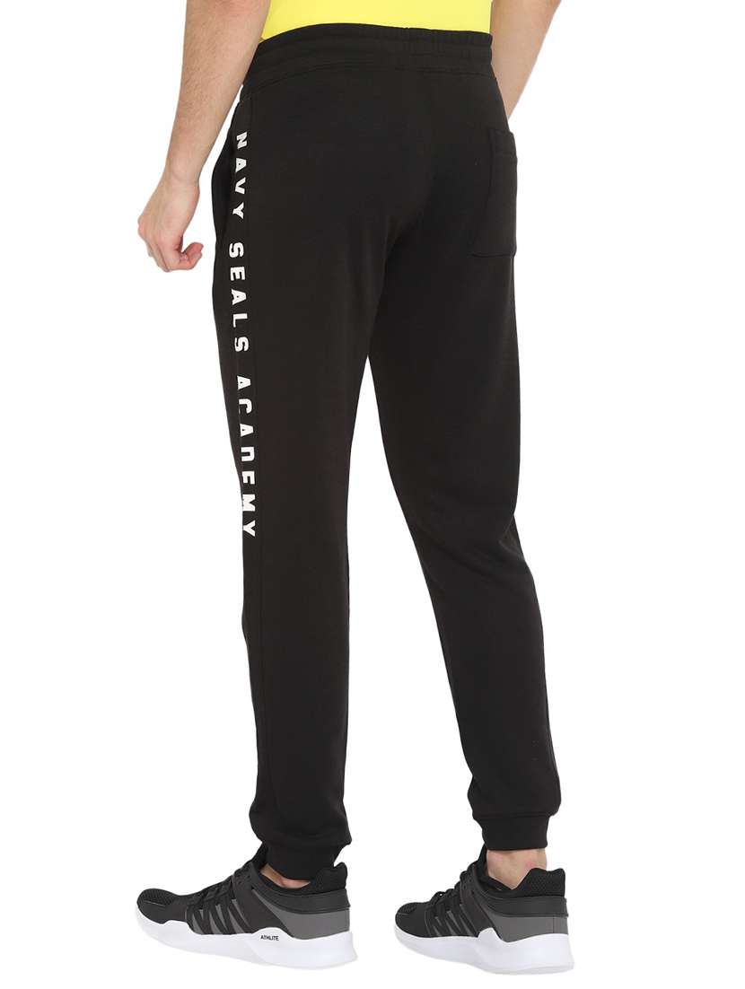 men black placement print mid rise jogger - 19223837 -  Standard Image - 2