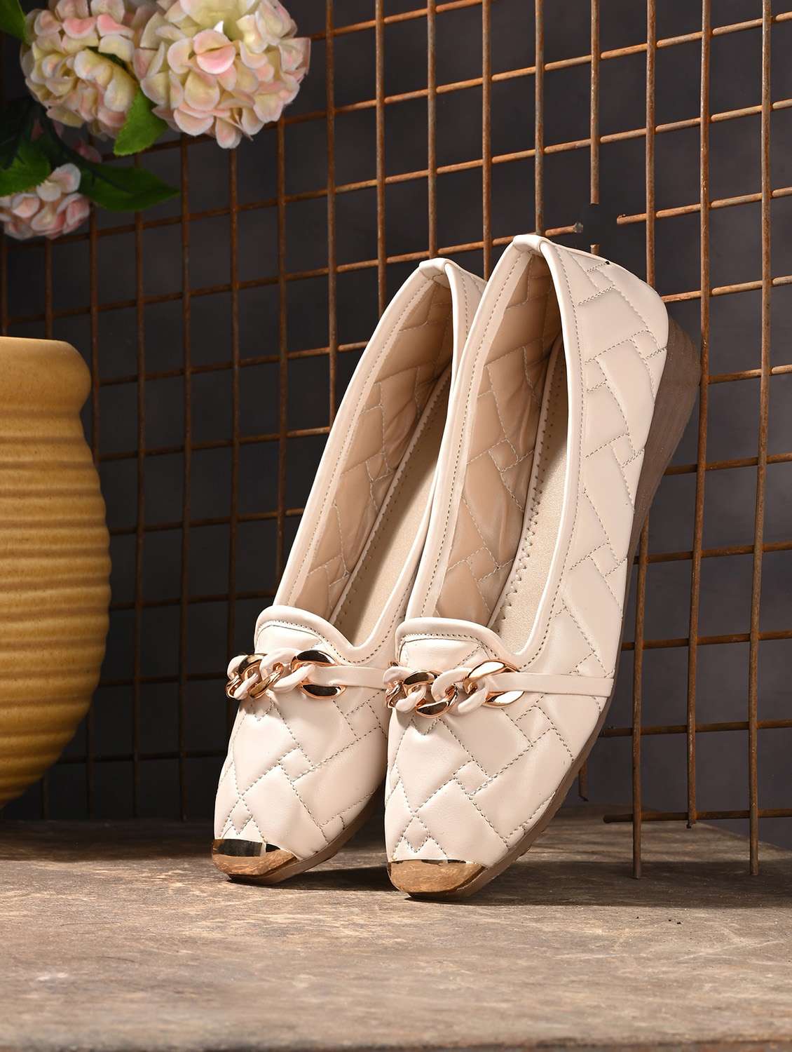 white synthetic slip on loafers