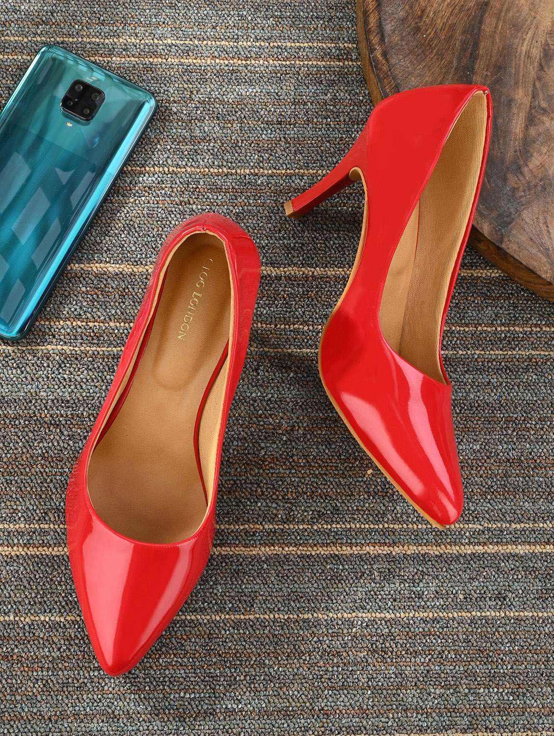 red synthetic slip on pumps