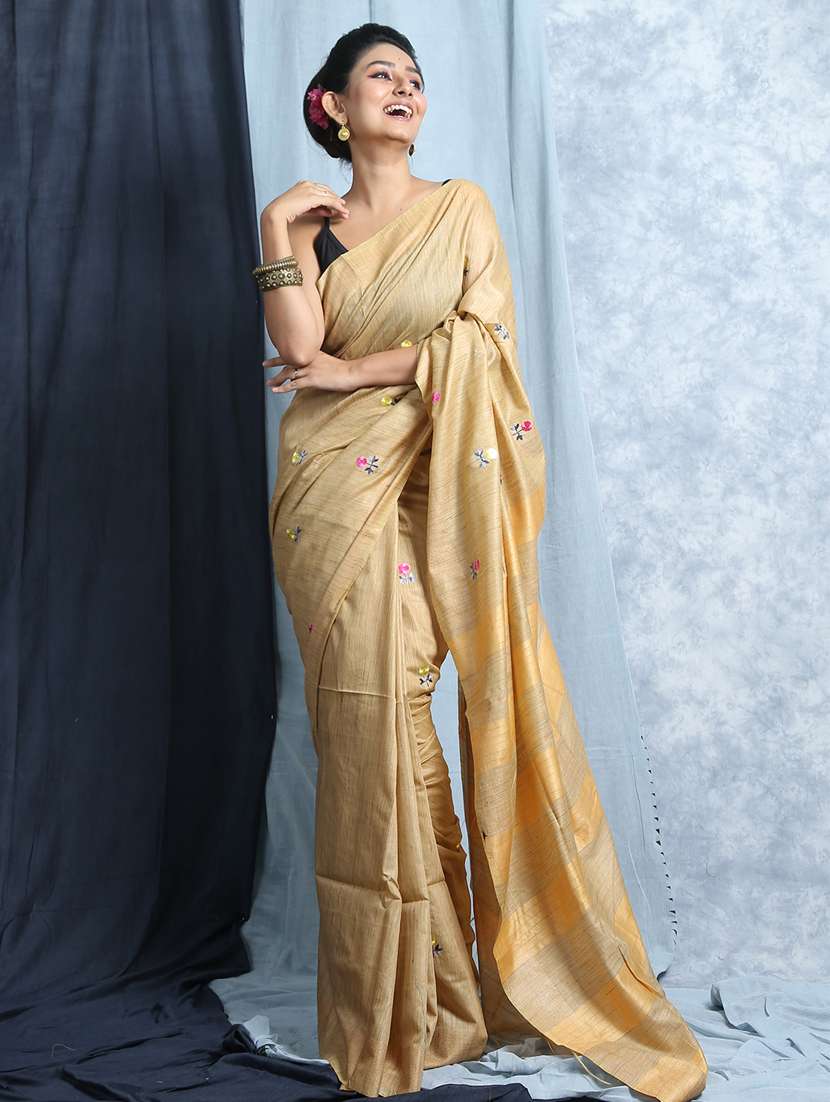 women's self design beige colored saree with blouse