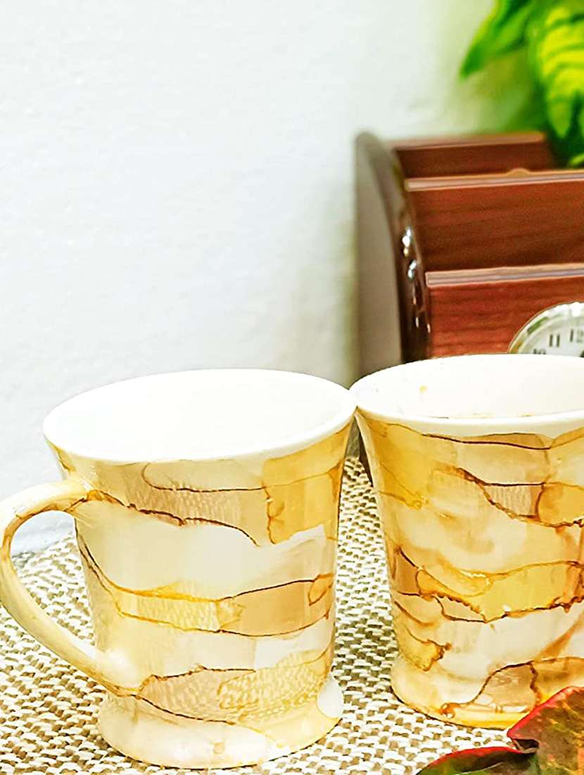caffeine ceramic handmade yellow & gold tea cup set (set of 4) - 19408756 -  Standard Image - 2