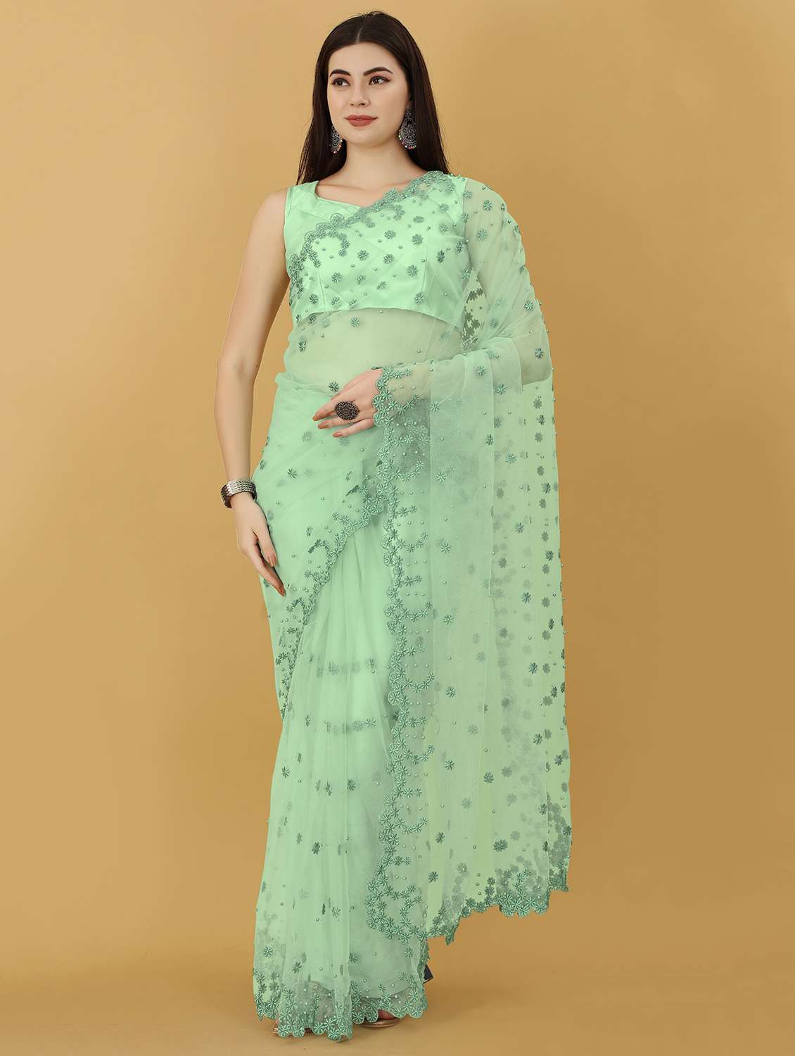 women's ethnic motifs green colored saree with blouse