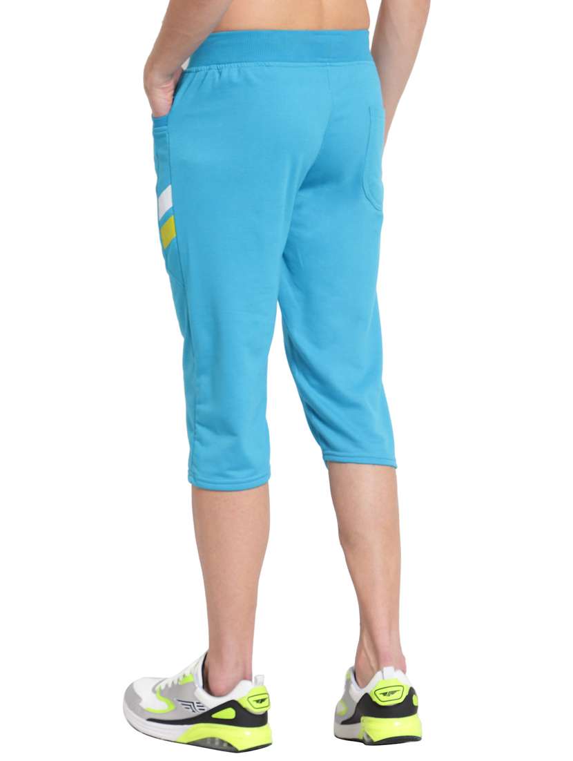 blue solid mid rise three fourth - 19494387 - Standard Image - 2