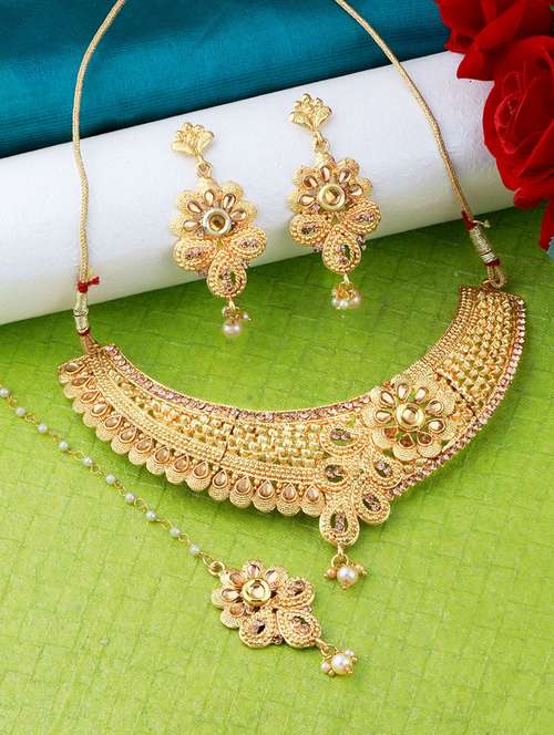 gold brass necklaces and earring - 19693769 -  Standard Image - 0