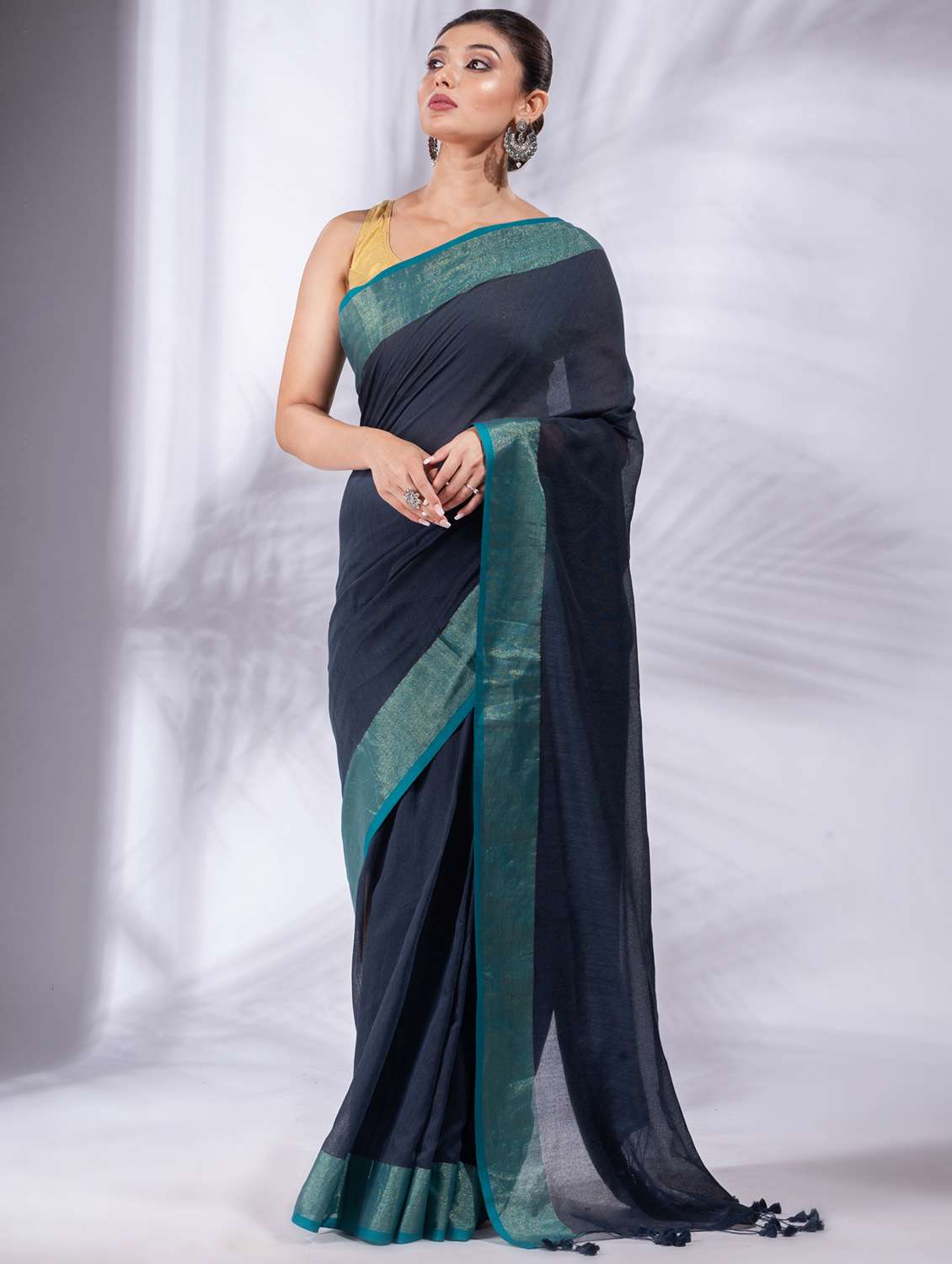 women's bordered navy blue colored saree with blouse