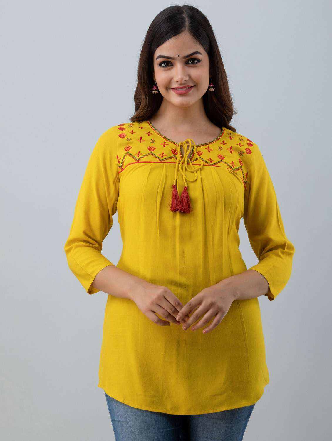 yellow embroidered tie-up neck regular tunic 