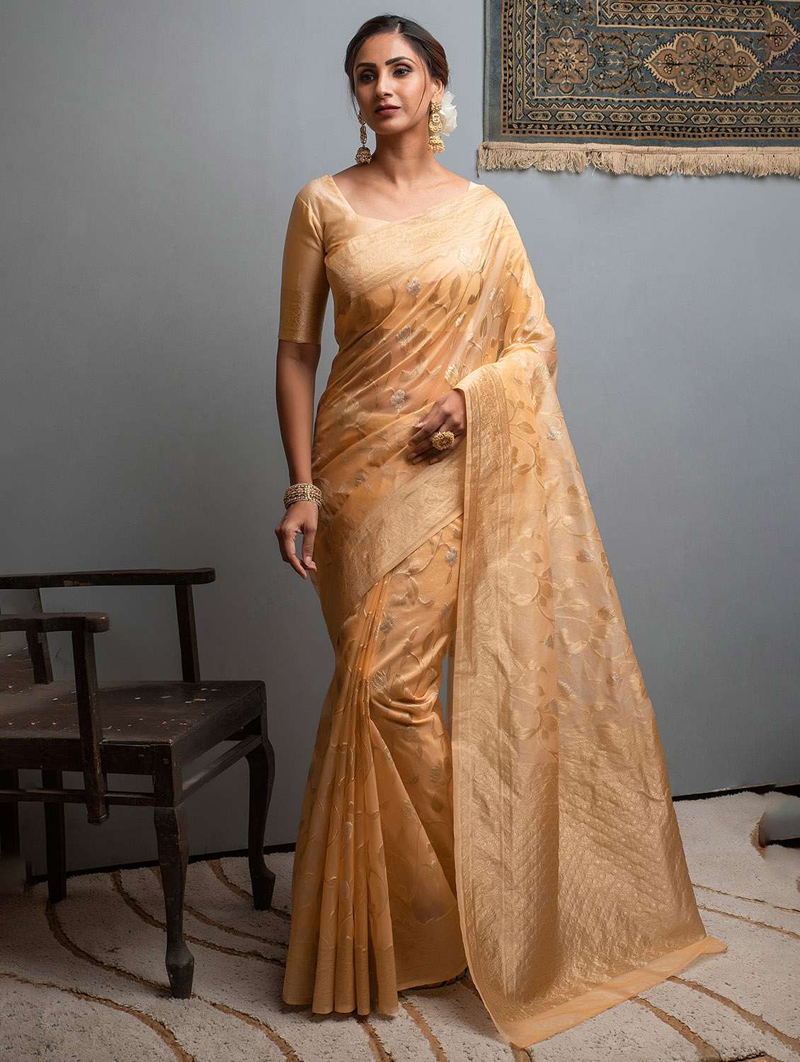 women's floral orange colored saree with blouse