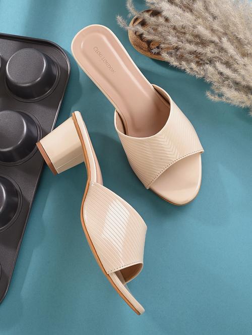beige synthetic slip on sandals - 19847453 - Standard Image - 0
