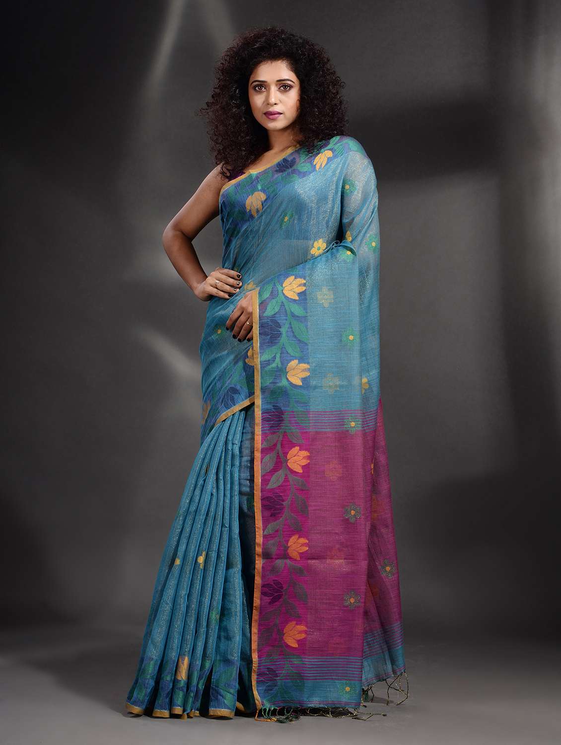 women's self design teal colored saree