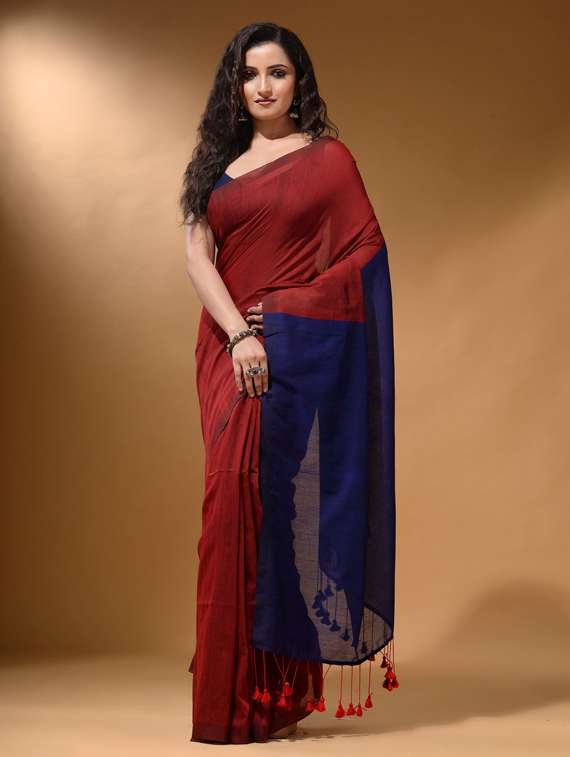 women's solid maroon colored saree with blouse