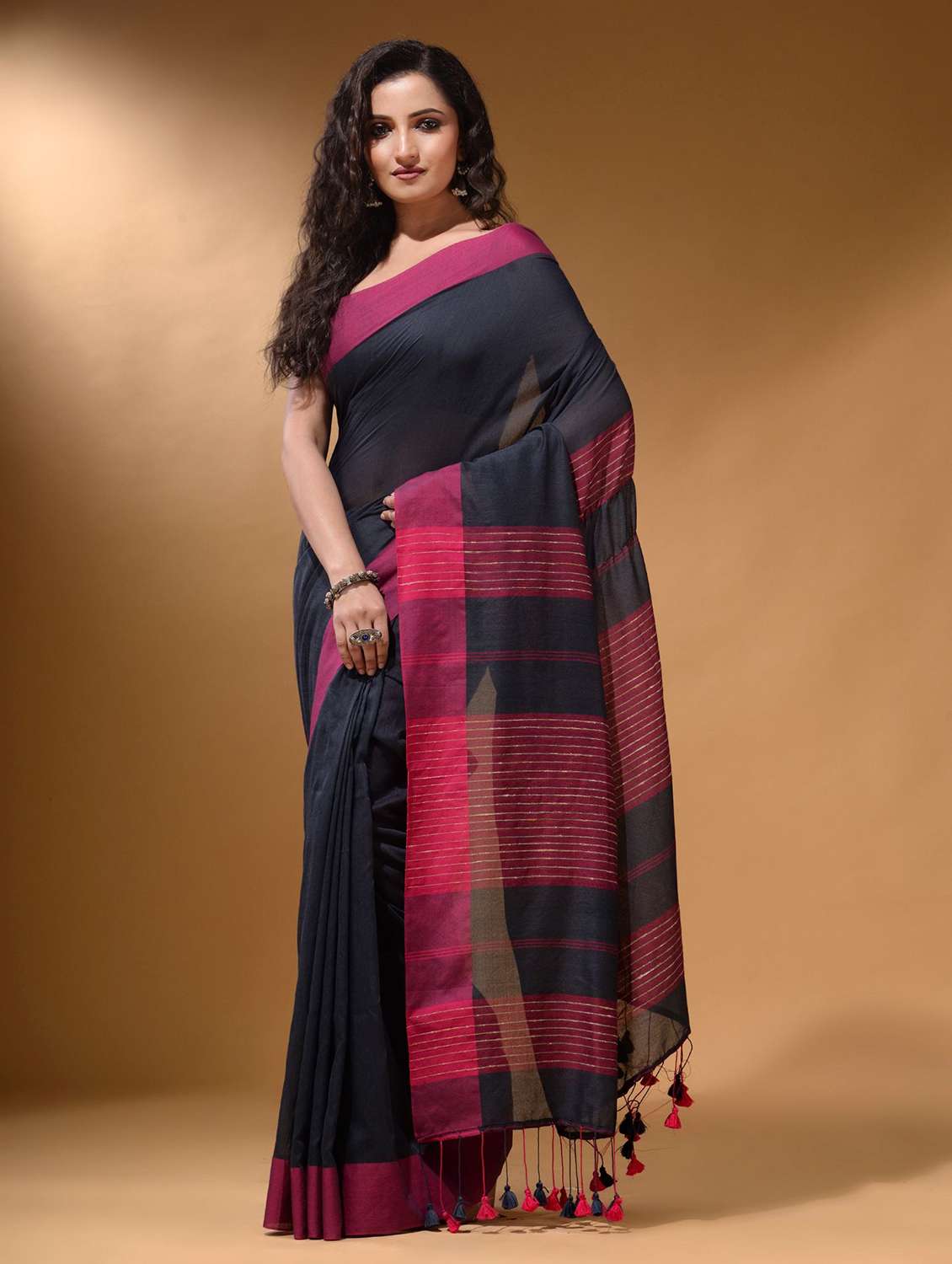women's self design black colored saree with blouse