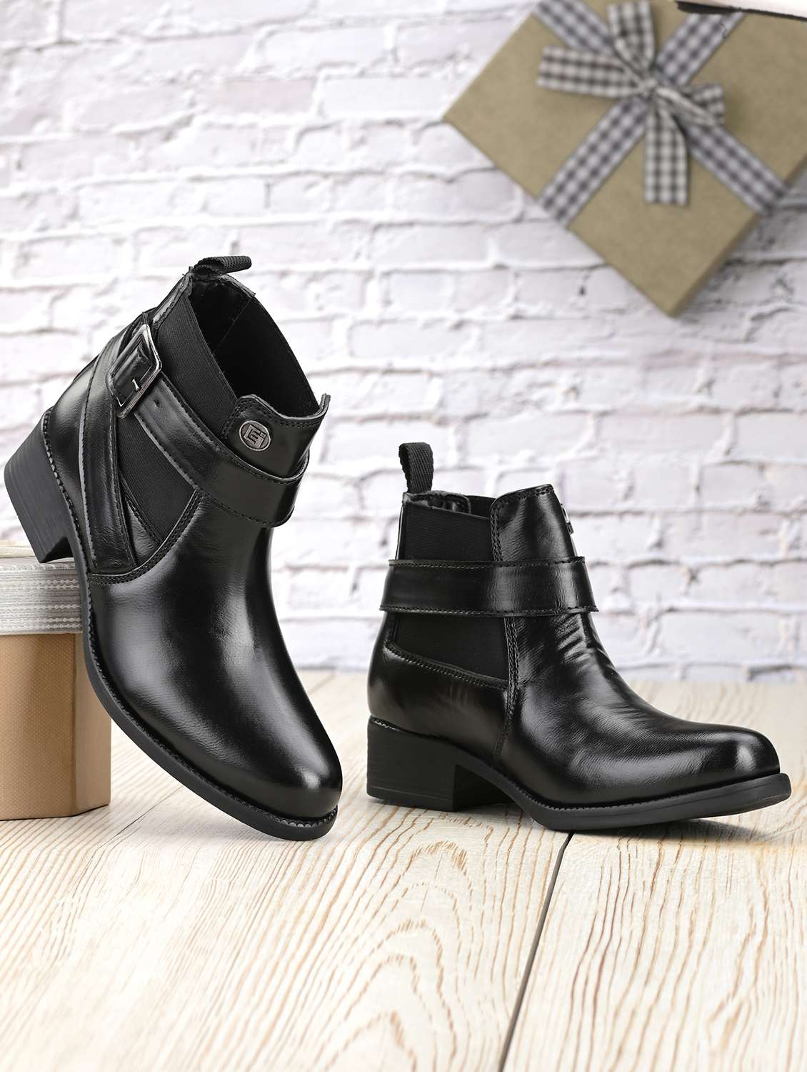 black synthetic hightops boots