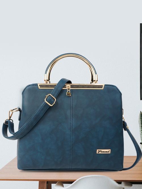 blue solid handbag - 19956583 -  Standard Image - 0