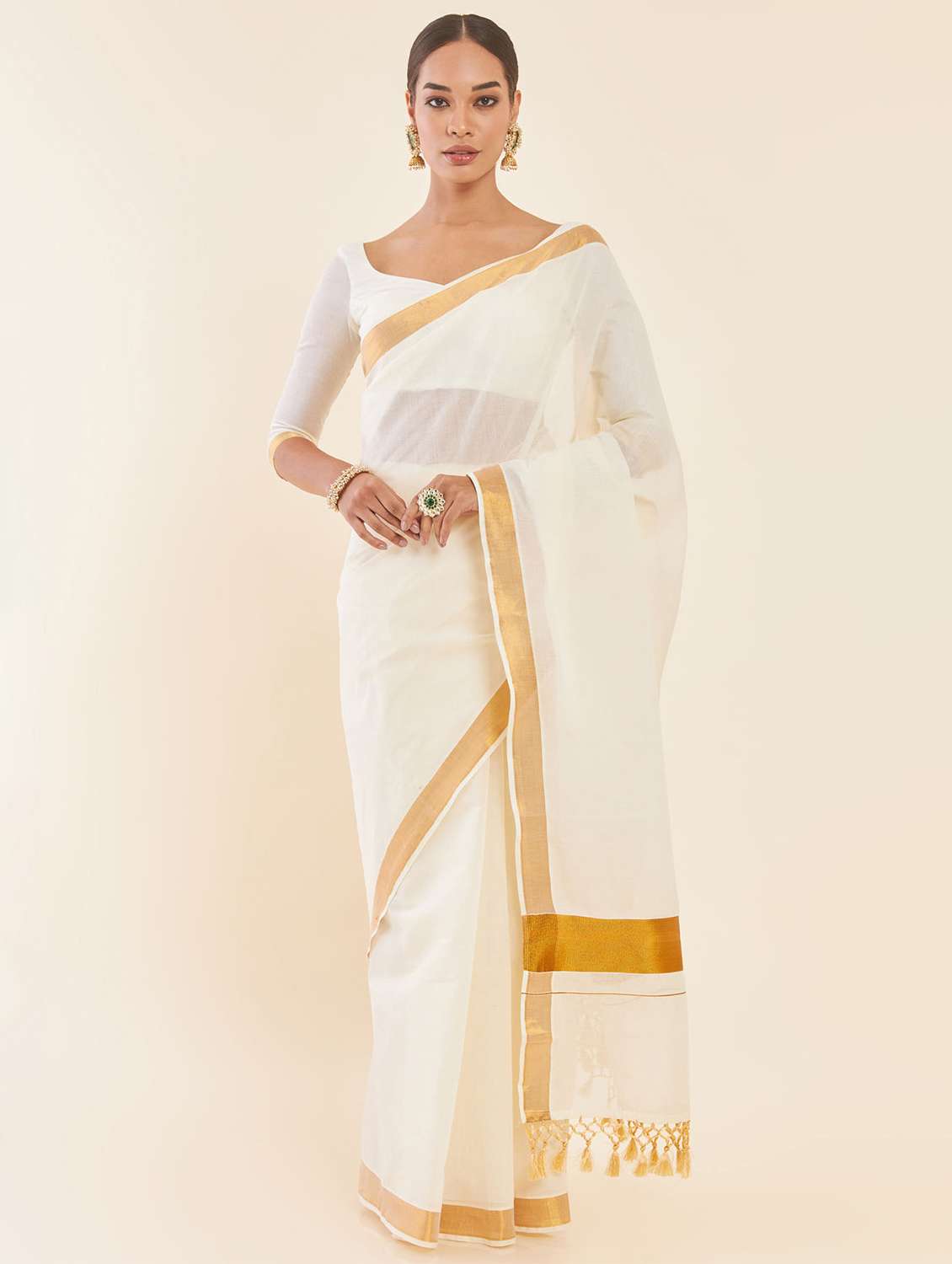 women's self design off white colored saree