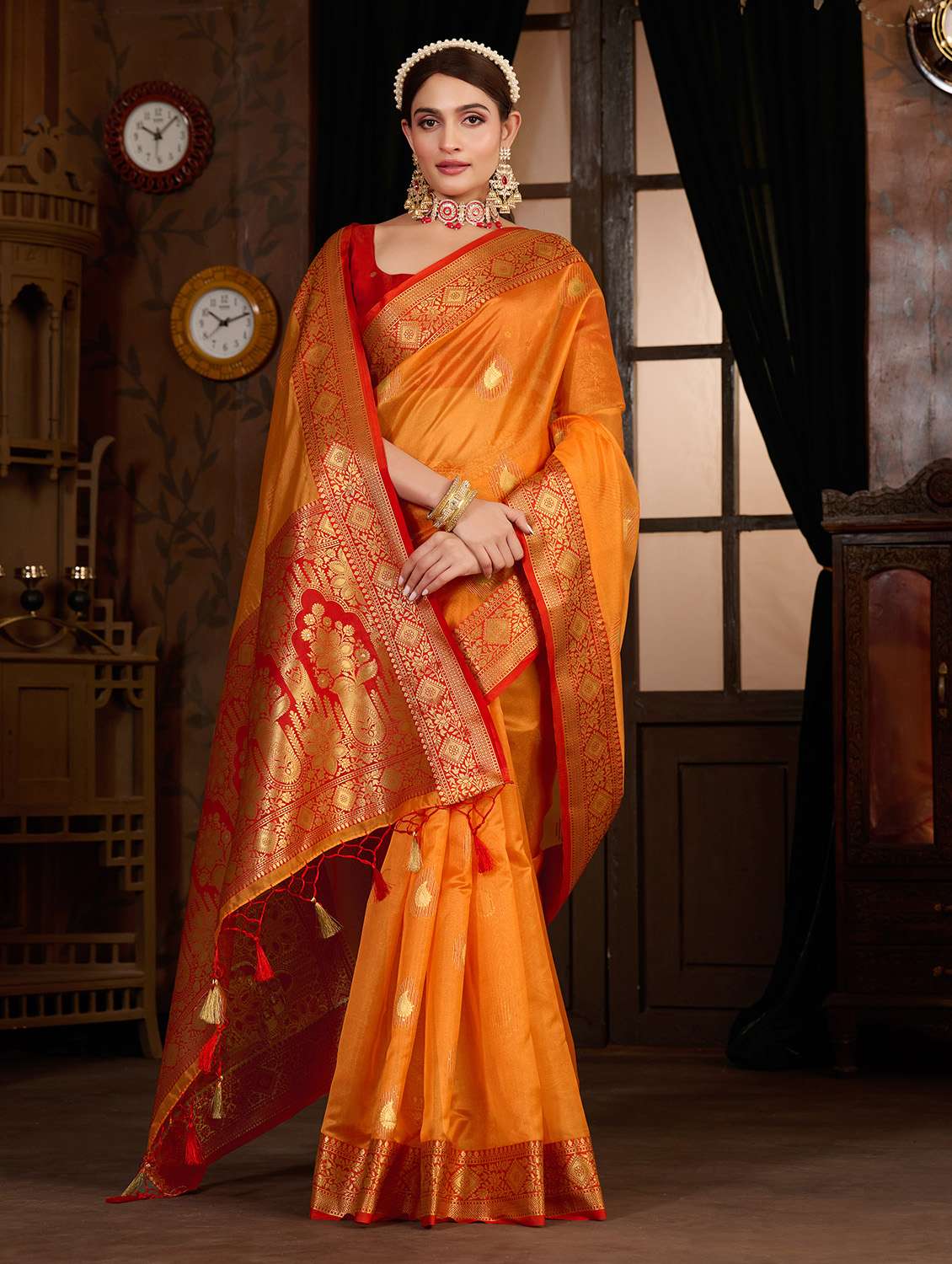 women's self design orange colored saree with blouse